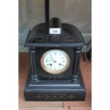 A VINTAGE HEAVY SLATE CHIMING MANTLE CLOCK