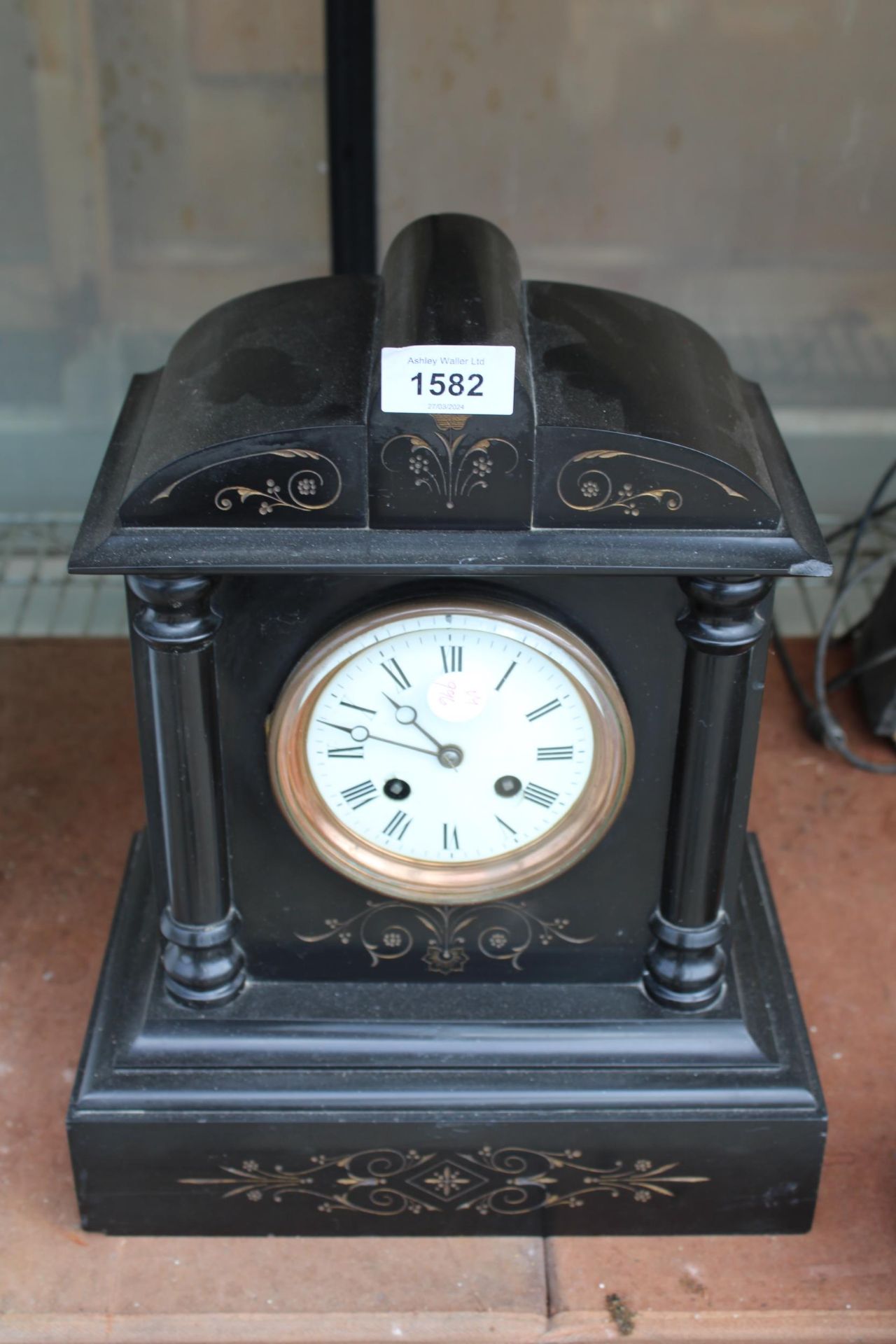 A VINTAGE HEAVY SLATE CHIMING MANTLE CLOCK