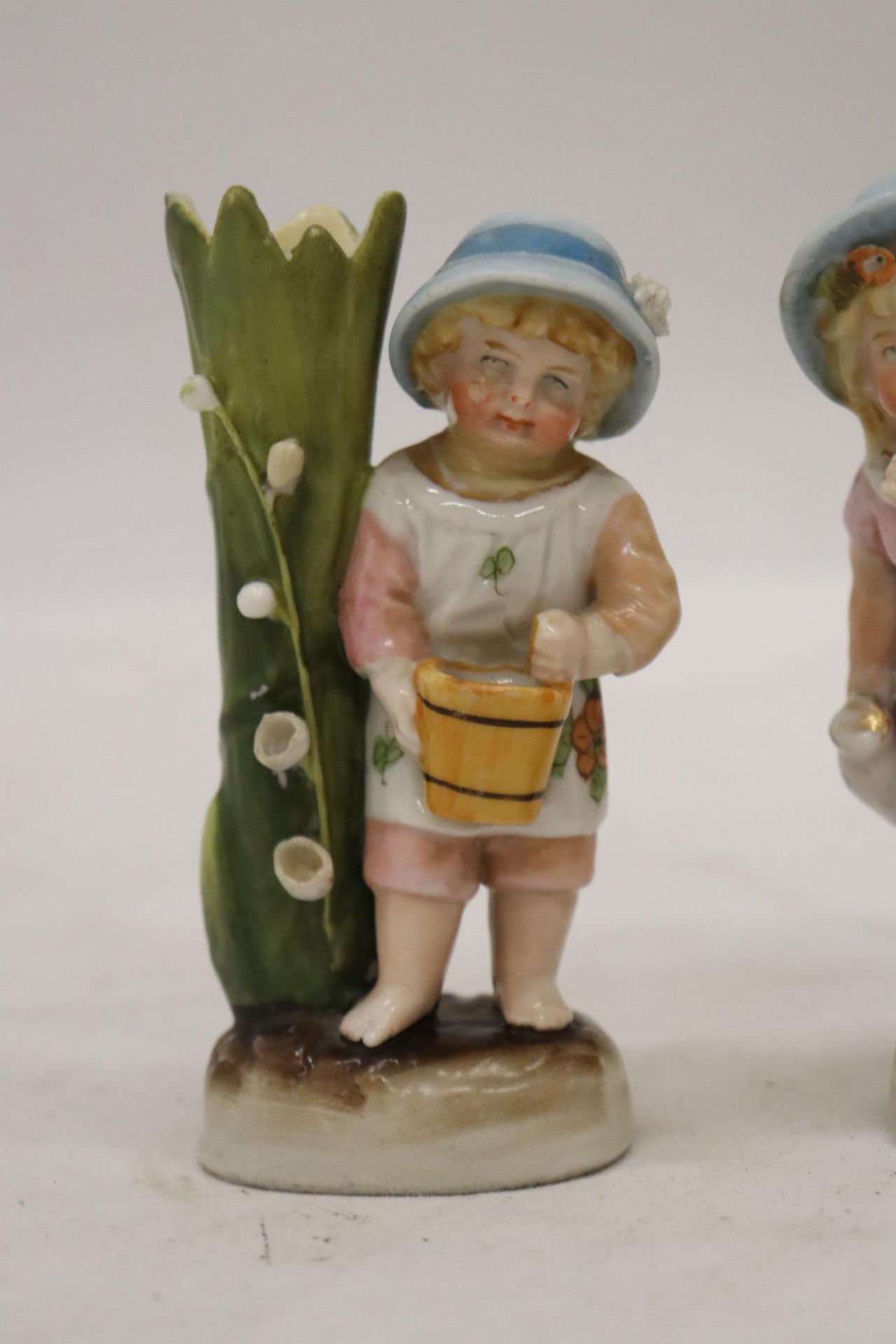 TWO VINTAGE GERMAN FAIRINGS TO INCLUDE A GIRL WITH JUG VASE AND A GIRL WITH BASKET VASE GOOD COLOURS - Image 2 of 8