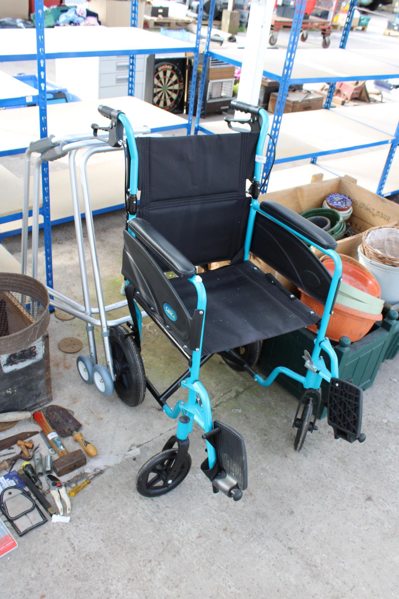 A CARECO FOLDING WHEEL CHAIR AND TWO WALKING FRAMES