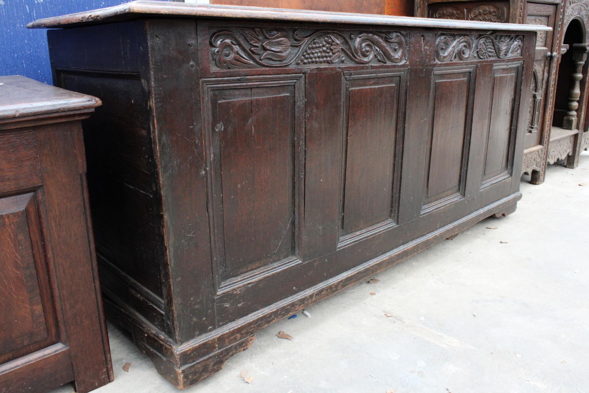 A GEORGIAN OAK BLANKET CHEST WITH FOUR PANEL FRONT ND FOLIAGE FRIEZE CARVING, 61" WIDE - Image 2 of 5