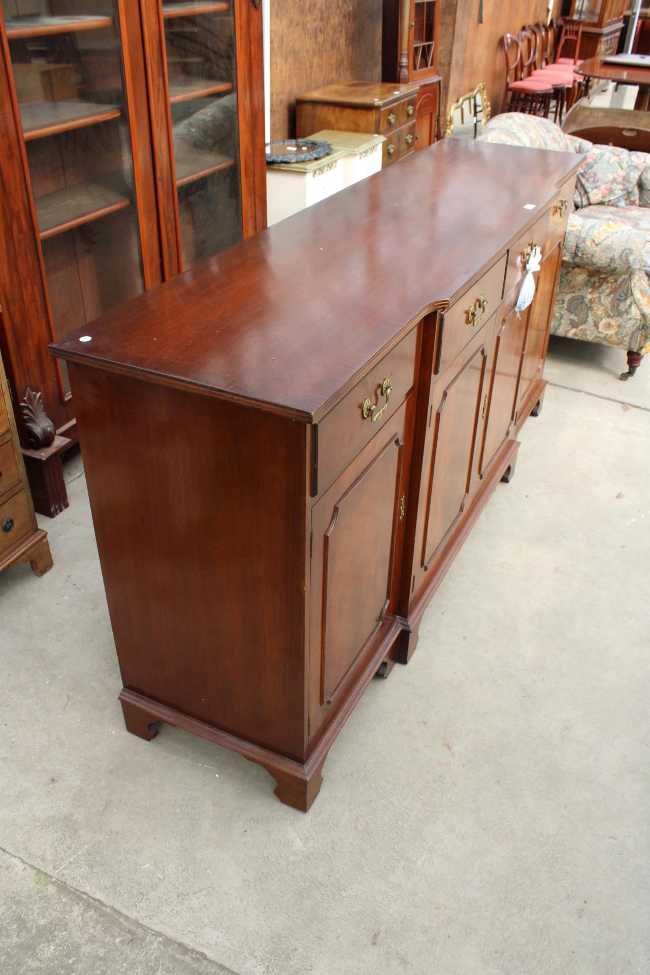 A MAHOGANY AND CROSS BANDED BREAKFRONT REPRODUX SIDEBOARD ENCLOSING FOUR DRAWERS AND FOUR CUPBOARDS, - Image 2 of 5
