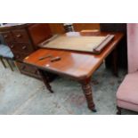 AN EDWARDIAN MAHOGANY WIND OUT DINING TABLE WITH CANTED CORNERS 42" SQUARE (LEAF 16.5") ON TURNED