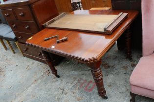 AN EDWARDIAN MAHOGANY WIND OUT DINING TABLE WITH CANTED CORNERS 42" SQUARE (LEAF 16.5") ON TURNED