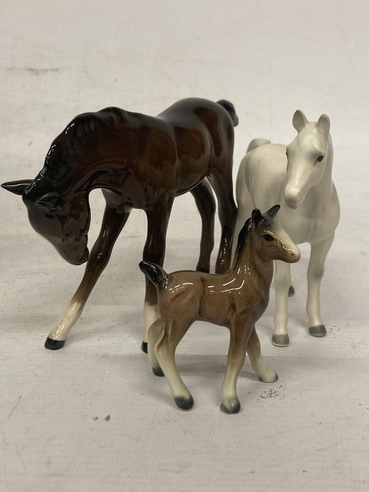 THREE CERAMIC HORSES TO INCLUDE ROYAL DOULTON
