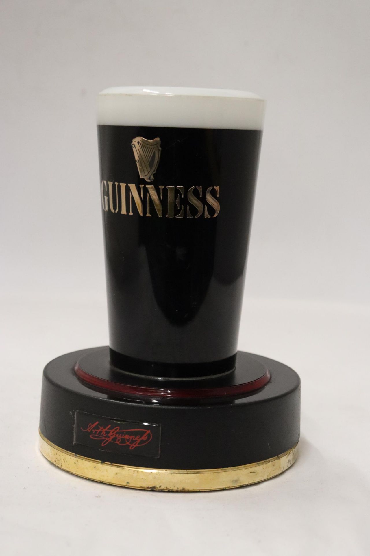A RARE GUINNESS, LIGHT UP COUNTER SIGN, IN THE FORM OF A PINT GLASS, HEIGHT 18CM