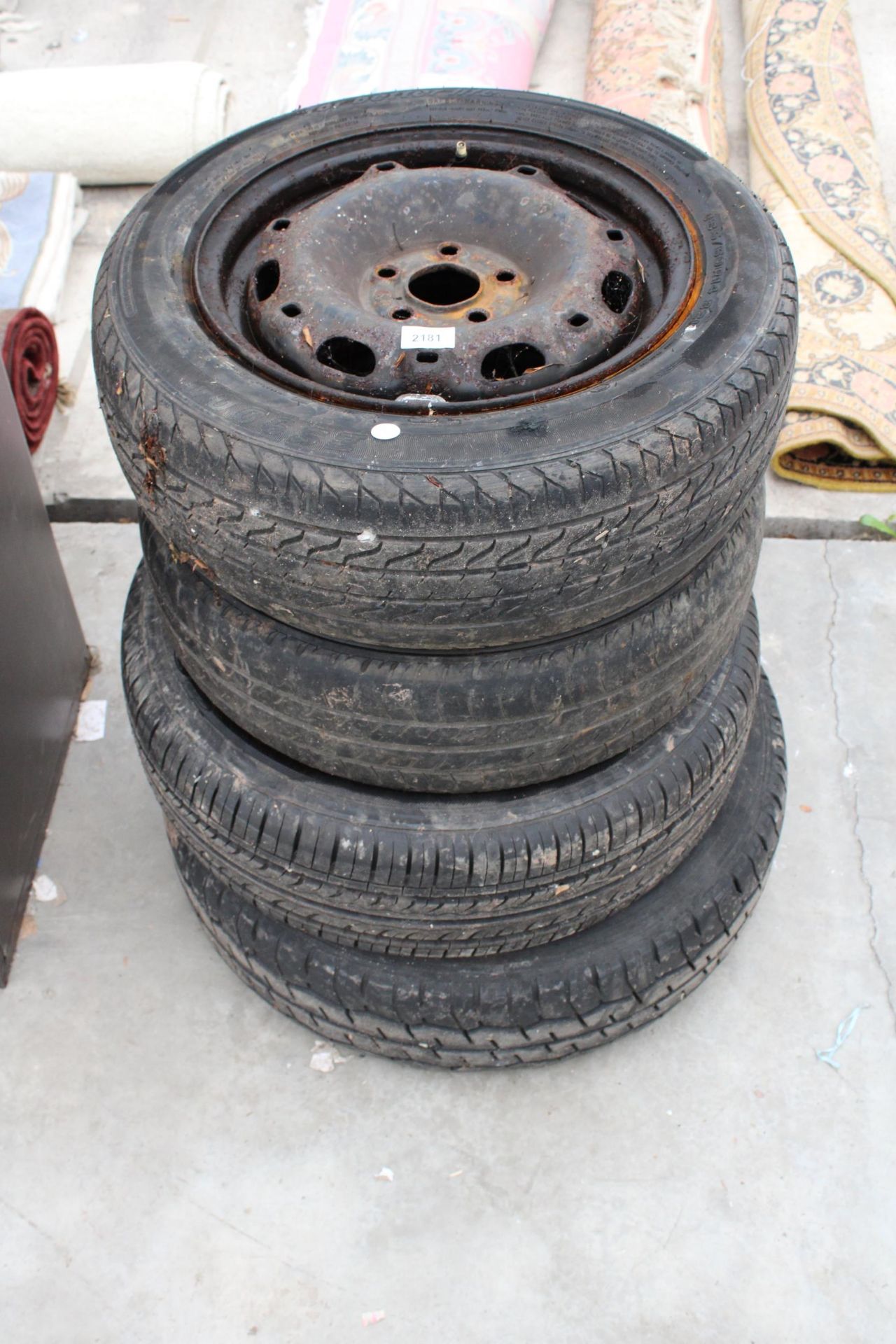 FOUR VARIOUS WHEELS AND TYRES