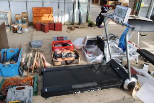 A REEBOK TREADMILL RUNNING MACHINE WITH POWER LEAD AND MANUAL