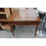 A MID 20TH CENTURY OAK AND BEECH DRAW LEAF DINING TABLE