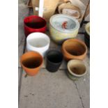 AN ASSORTMENT OF GLAZED AND TERRACOTTA GARDEN POTS