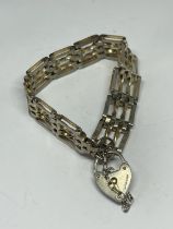 A SILVER FOUR BAR GATE BRACELET