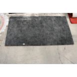 A MODERN GREY RUG