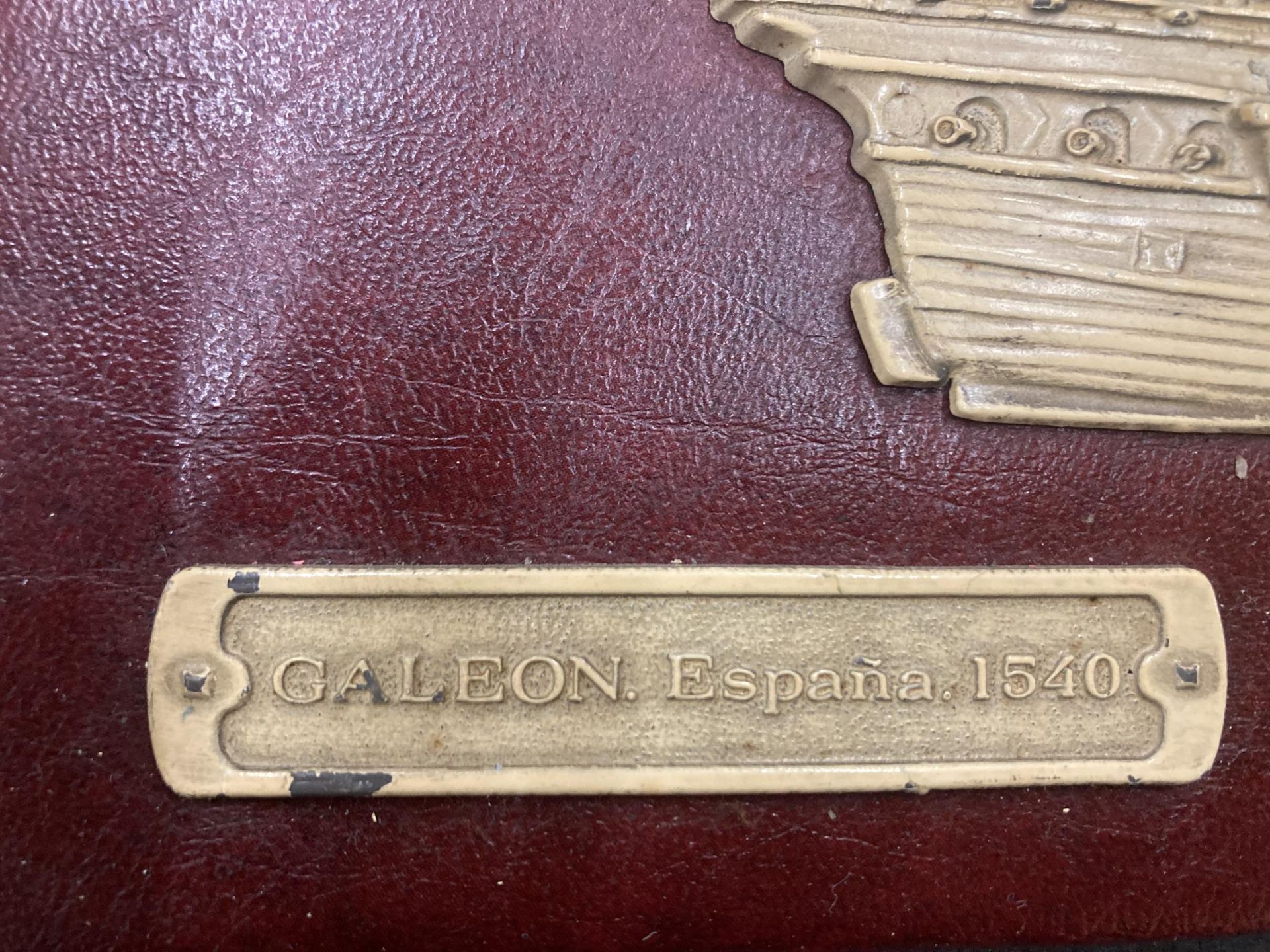 A VINTAGE EMBOSSED SPANISH GALLEON ON RED MOROCCO LEATHER, 30CM X 24CM - Image 2 of 2