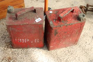 TWO VINTAGE METAL FUEL CANS WITH BRASS CAPS