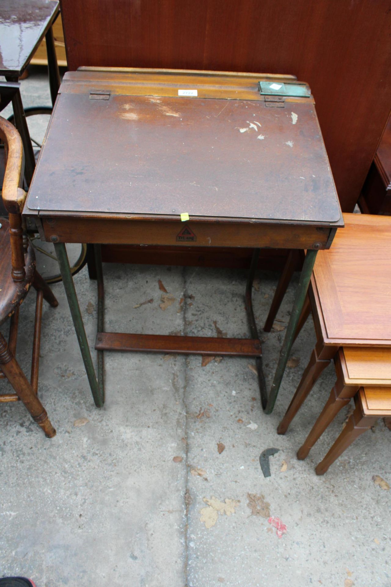 A MID 20TH CENTURY TRI-ANG CHILDS DESK ON TUBULAR FRAME