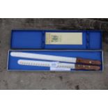 A BOXED GRANTON CARVING KNIFE SET