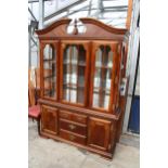 A MODERN HARDWOOD BOOKCASE ON BASE WITH SWAN NECK PEDIMENT, 56" WIDE