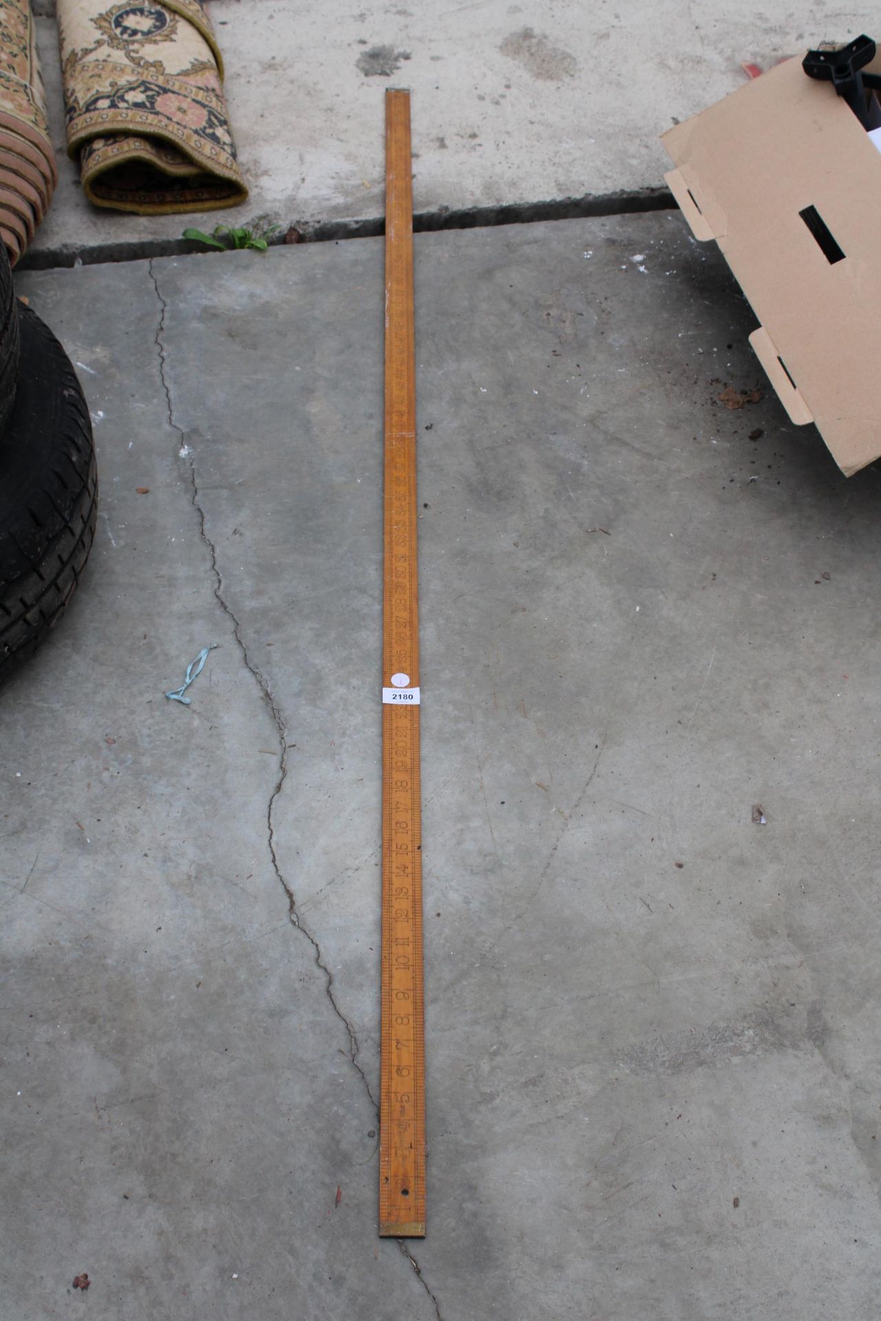 A 71" WOODEN RULER