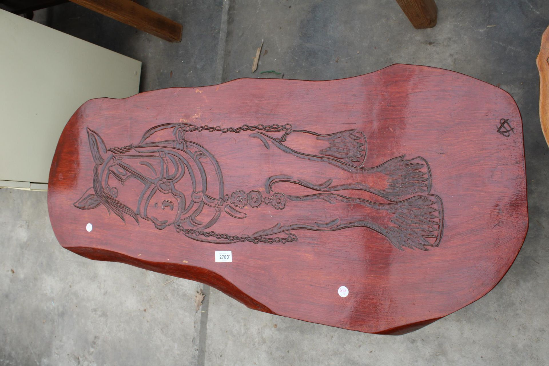 A STAINED ELM COFFEE TABLE, THE TOP HAVING CARVING OF A HORSE, SIGNED A.S, 42" X 18" - Bild 2 aus 3