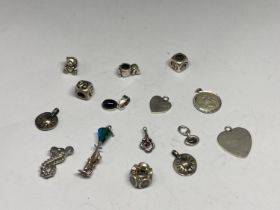 FIFTEEN SILVER CHARMS