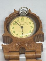 A RAILWAY TIMEKEEPER DUKE POCKET WATCH IN A CARVED WOODEN CASE