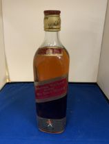 A BOTTLE OF JOHNNIE WALKER RED LABEL OLD SCOTCH WHISKY