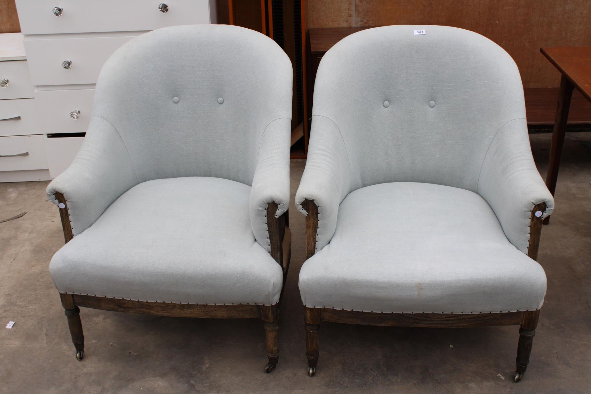 A PAIR OF VICTORIAN STYLE TUB CHAIRS