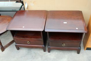 A PAIR OF STAG MINSTREL BEDSIDE TABLES