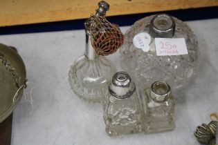 FOUR GLASS ITEMS WITH HALLMARKED SILVER TOPS