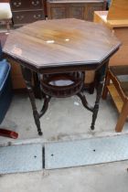 AN OCTAGONAL LATE VICTORIAN CENTRE TABLE WITH GALLERIED UNDER TIER 27" ACROSS