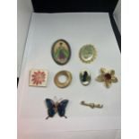 EIGHT COSTUME JEWELLERY BROOCHES