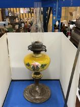 AN ART NOUVEAU COPPER AND PAINTED GLASS OIL LAMP