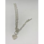 A SILVER T BAR NECKLACE WITH HEART CHARM LENGTH 18"