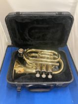 A JOHN SCHEERER & SON PRIMO POCKET TRUMPET WITH CASE