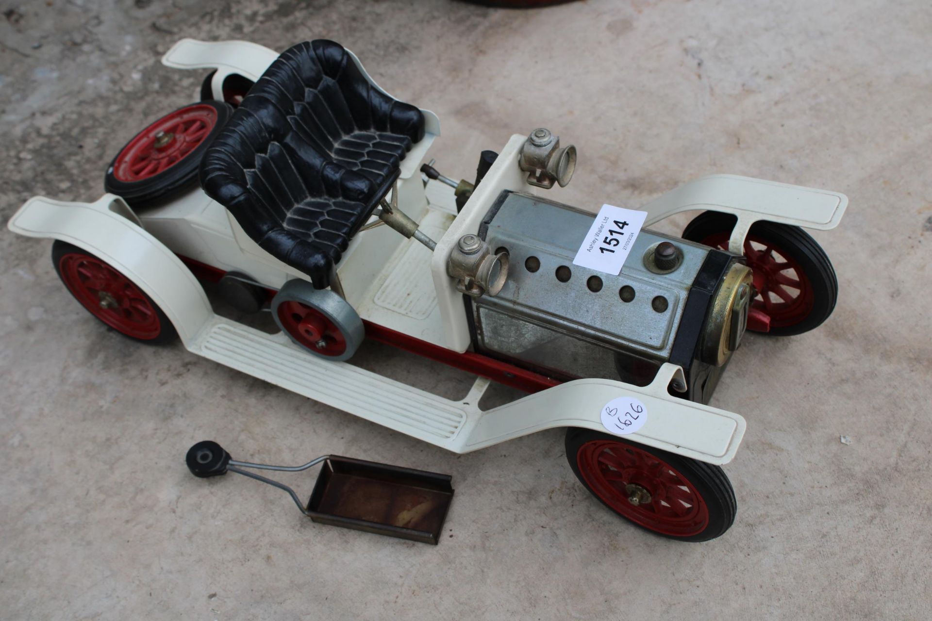 A VINTAGE MAMOD TIN PLATE STEAM POWERED CAR