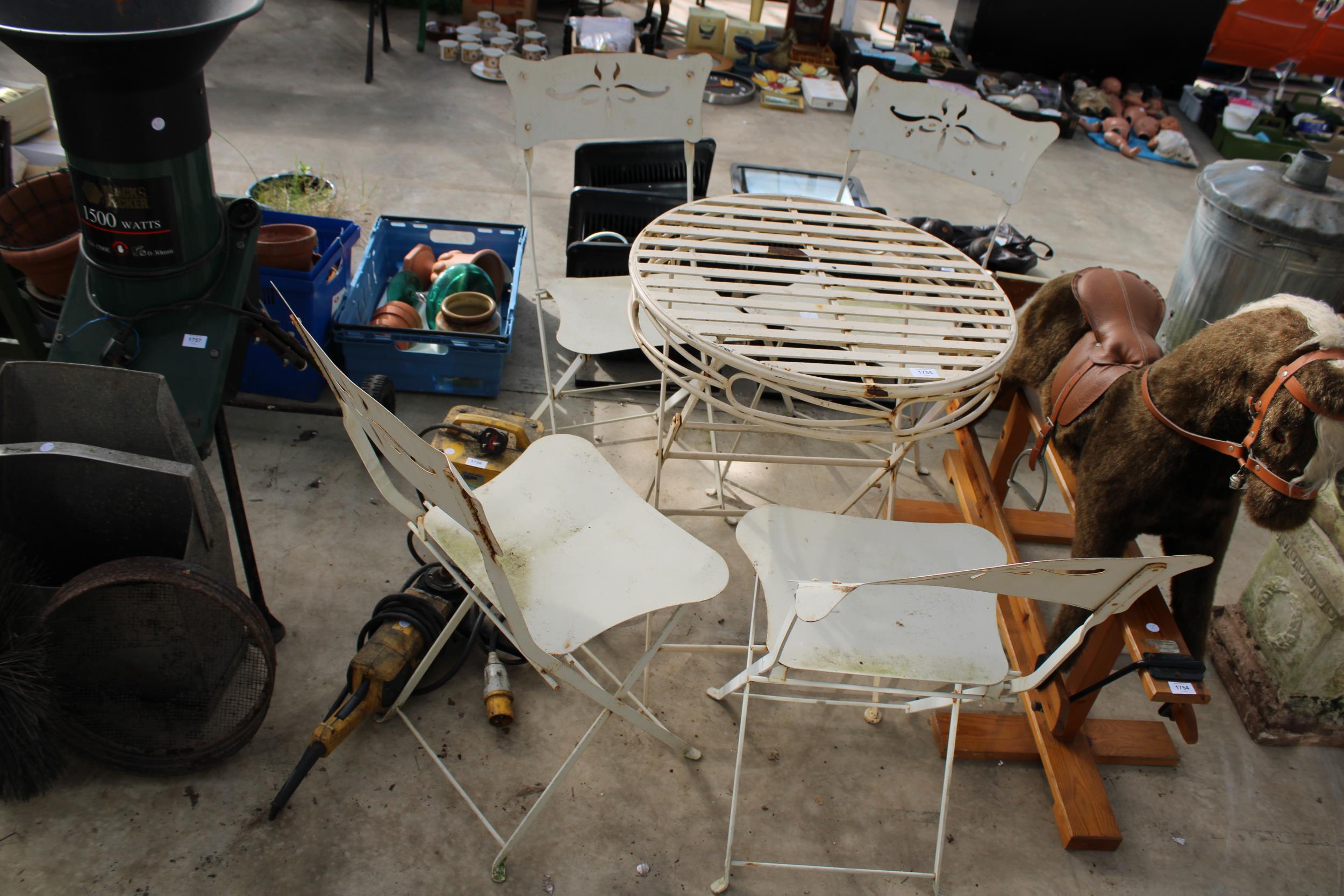 A METAL FOLDING BISTRO SET COMPRISING OF A ROUND TABLE AND FOUR CHAIRS - Image 2 of 3