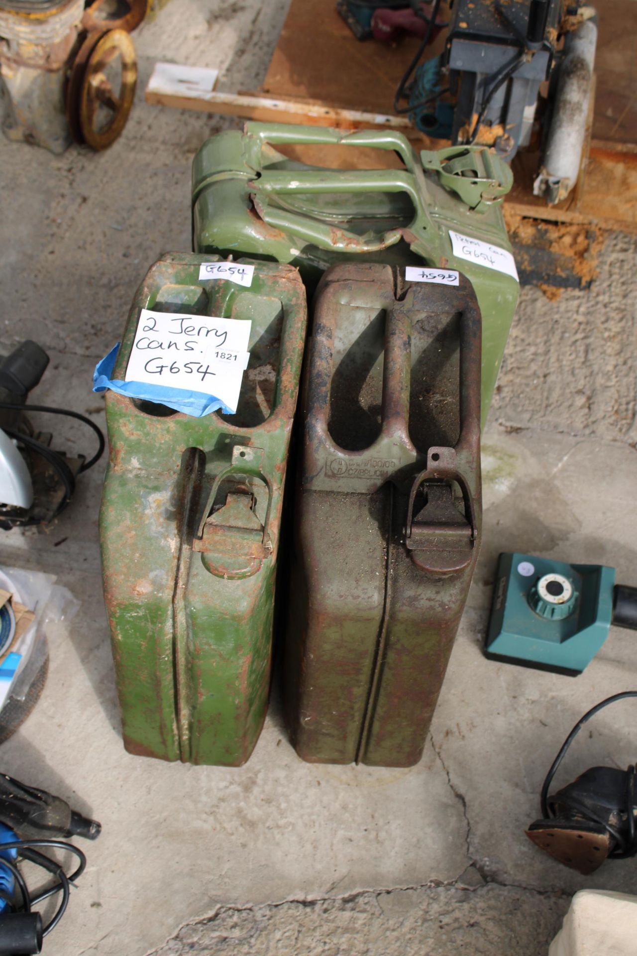 TWO GREEN METAL JERRY CANS