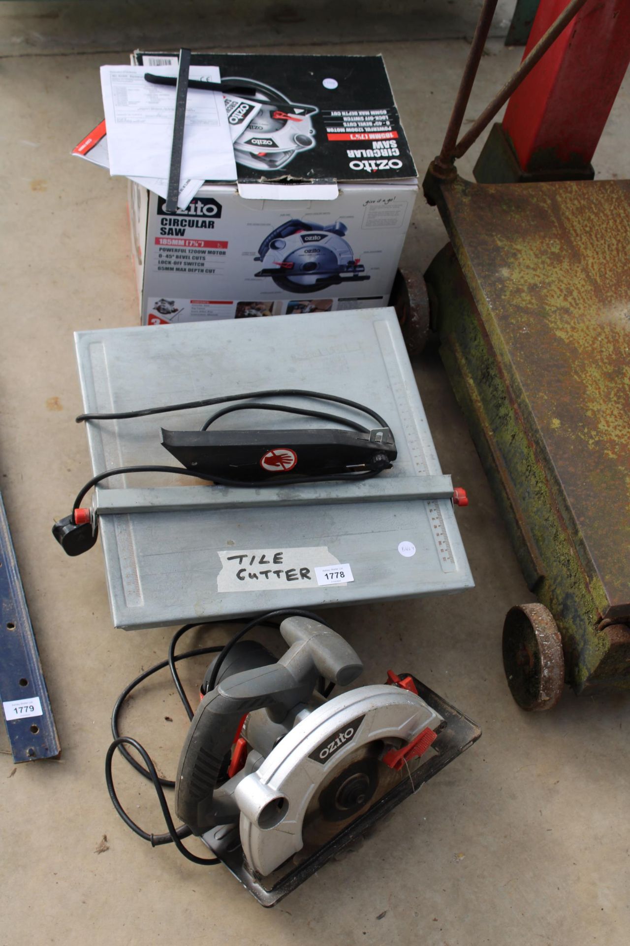 AN ELECTRIC TILE CUTTER AND AN OZITO CIRCULAR SAW
