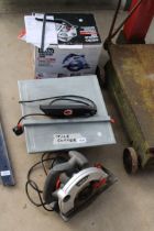 AN ELECTRIC TILE CUTTER AND AN OZITO CIRCULAR SAW