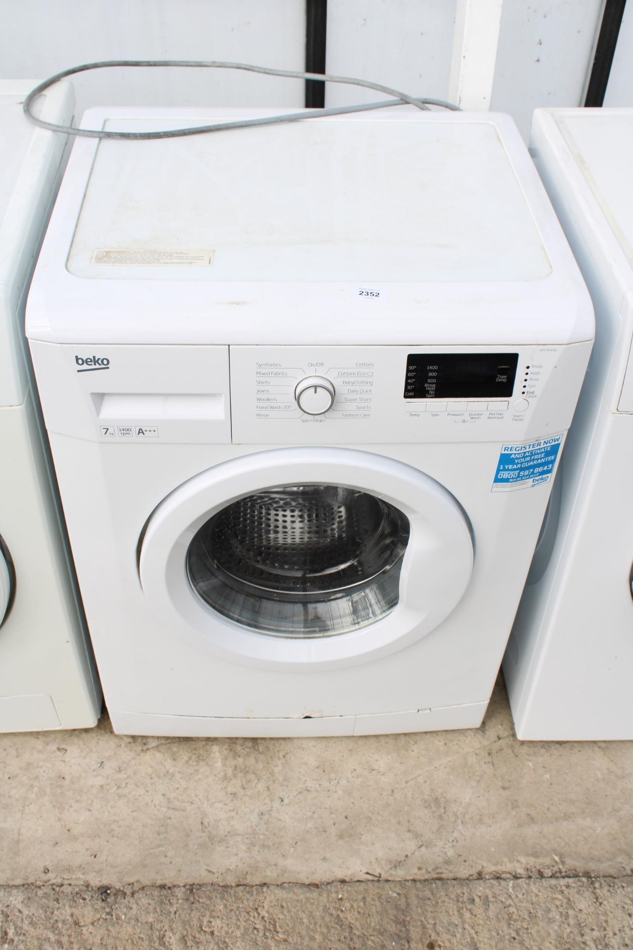 A WHITE BEKO 7KG WASHING MACHINE