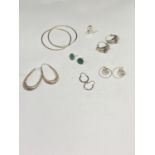 SEVEN PAIRS OF SILVER EARRINGS