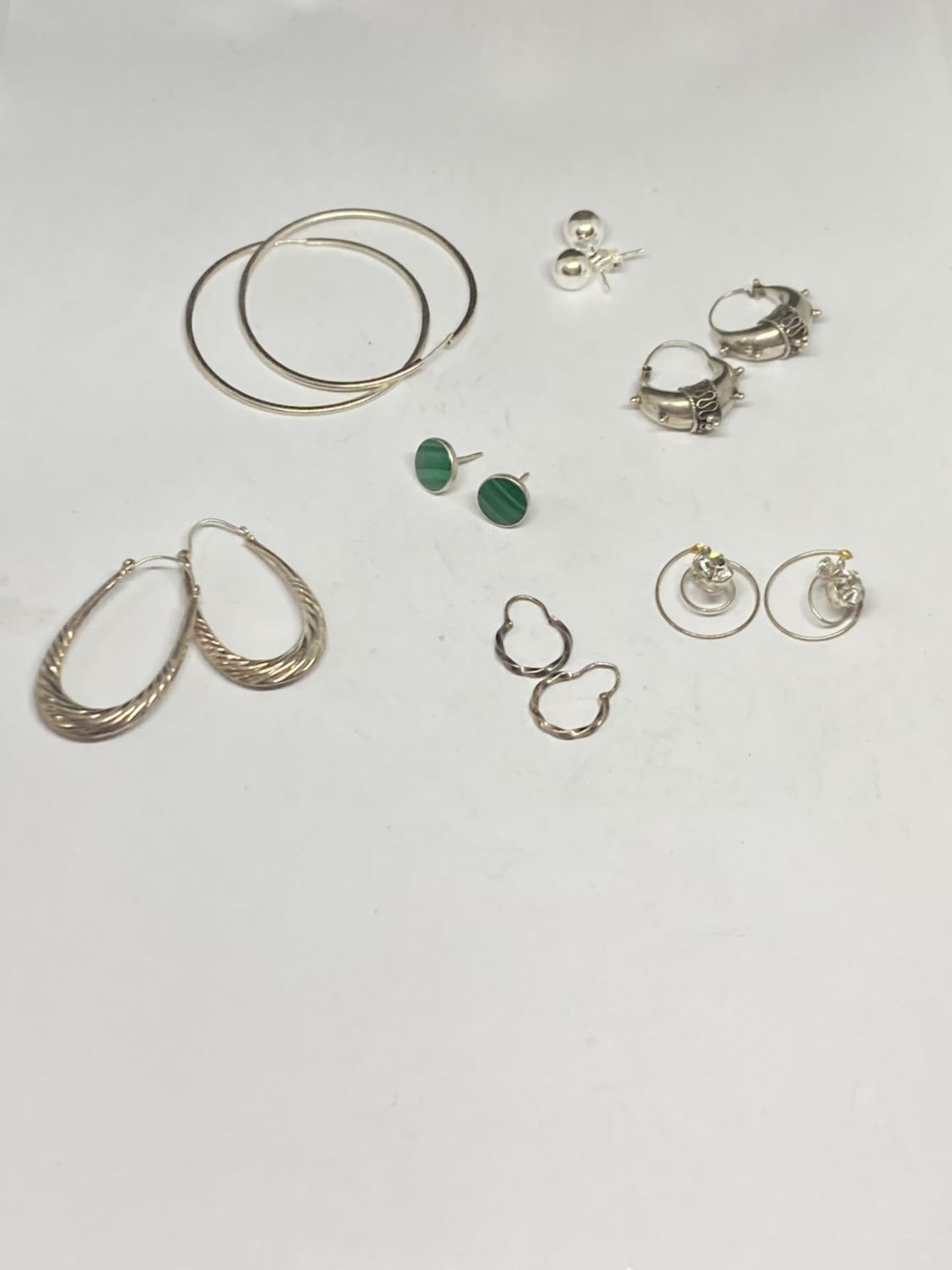 SEVEN PAIRS OF SILVER EARRINGS