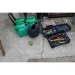 FOUR PLASTIC FUEL CANS, TWO WATERING CANS AND AN ASSORTMENT OF HAND TOOLS