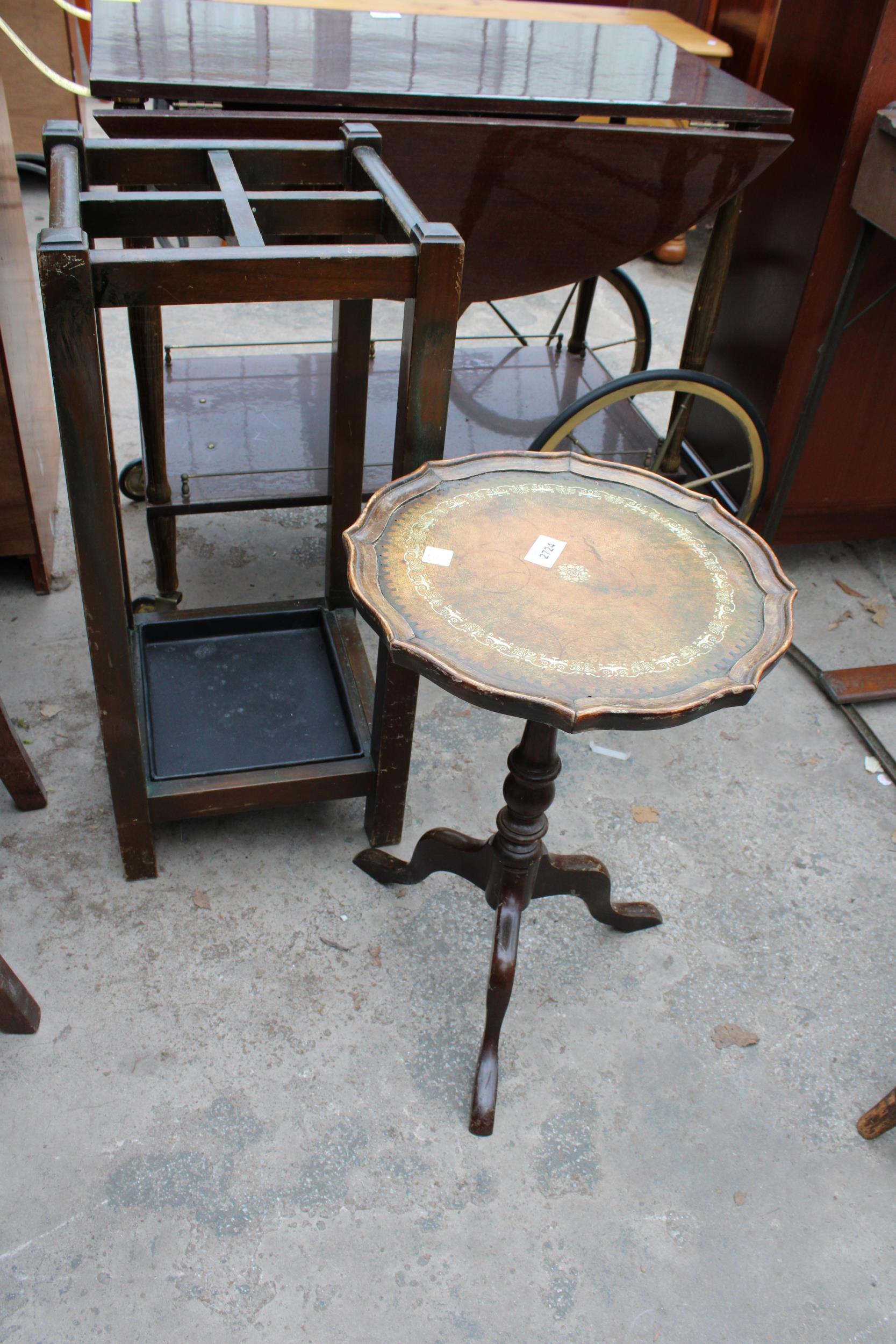 A MID 20TH CENTURY FOUR DIVISION STICK STAND AND TRIPOD WINE TABLE