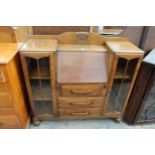 AN EARLY 20TH CENTURY OAK SIDE BY SIDE BUREAU 48" WIDE