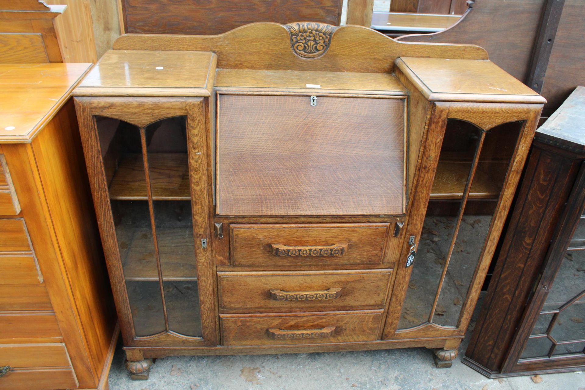 AN EARLY 20TH CENTURY OAK SIDE BY SIDE BUREAU 48" WIDE