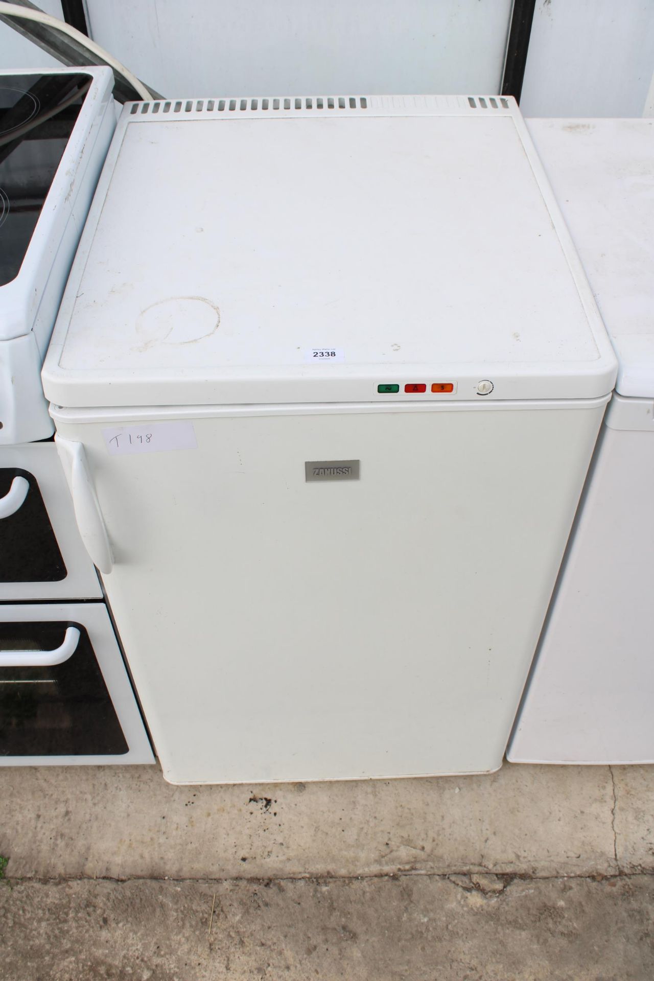 A WHITE ZANUSSI UNDERCOUNTER FREEZER