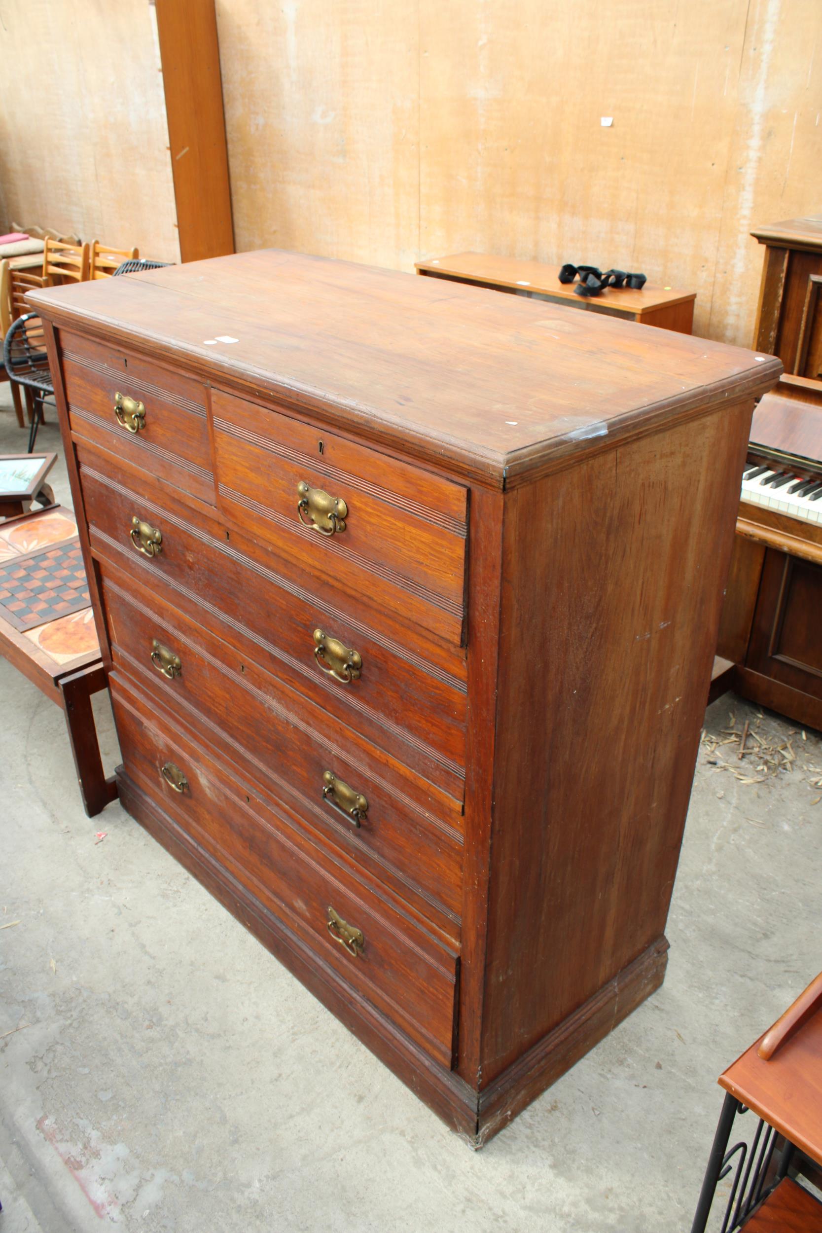 A LATE VICTORIAN PINE AND BEECH CHEST OF TWO SHORT AND THREE LONG DRAWERS 48" WIDE
