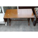 A MAHOGANY TWIN PEDESTAL DROP LEAF COFFEE TABLE