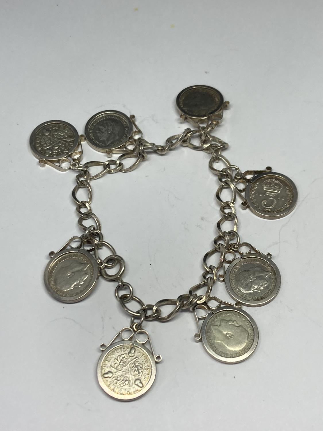 A SILVER JOEY CHARM BRACELET